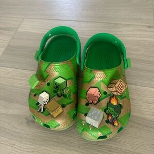 CROCS Kids Green and Gold Adventure Slippers